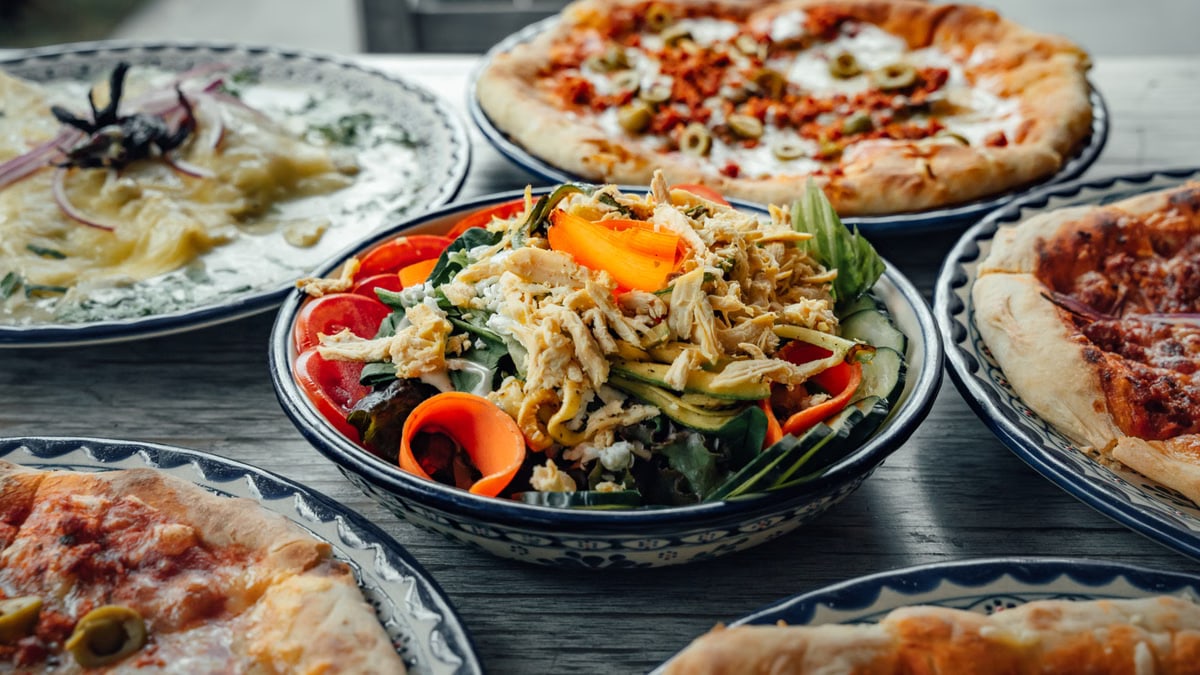 A vibrant spread of Mexican and Italian dishes, perfect for a delicious meal.